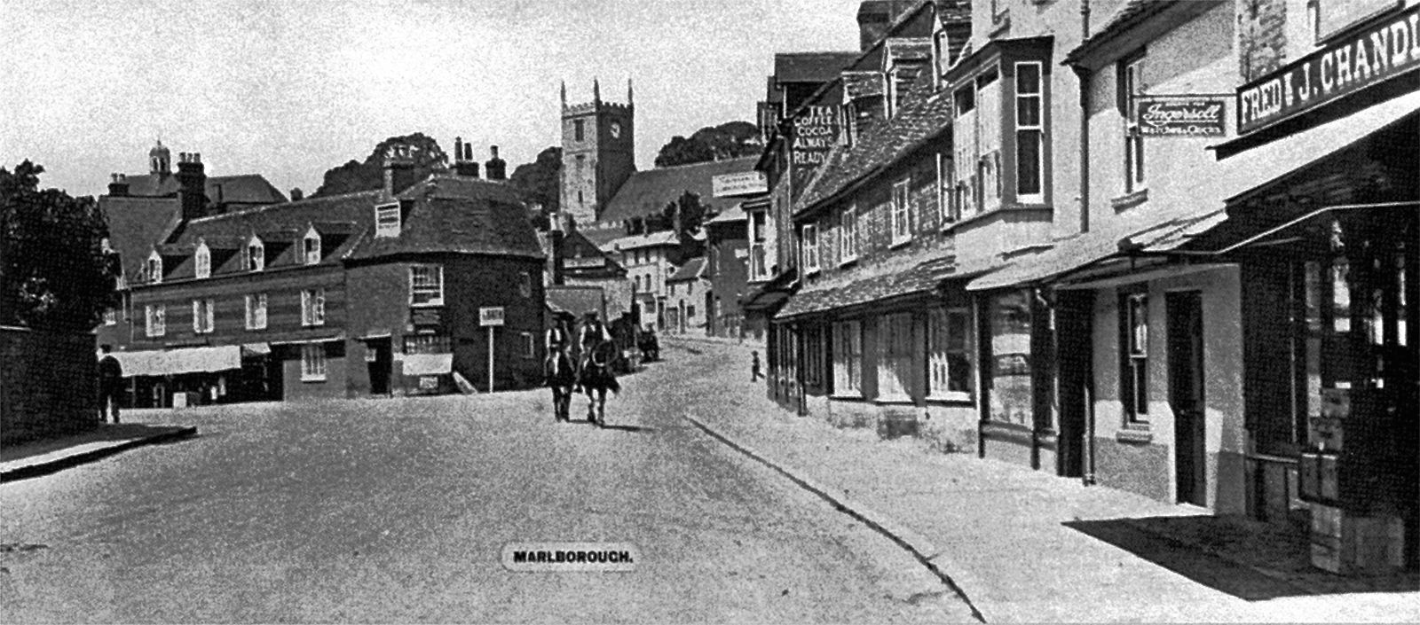 Horses in the London Road in the 1920's. Our shop Fredk J. Chandler on the right.