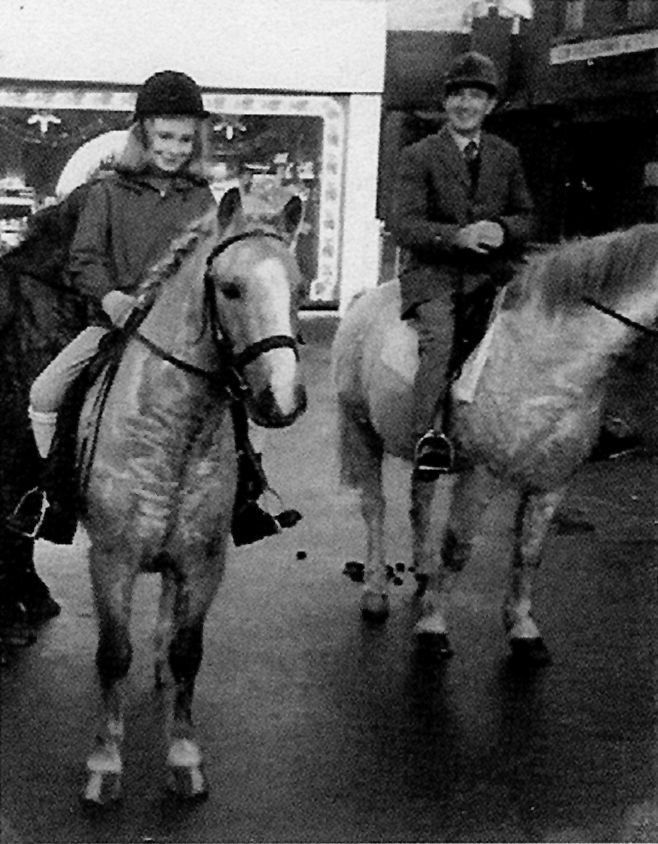 Catherine Wilford (nee Chandler) on Pirate Pete at the Boxing Day meet of the Tedworth Hunt in Pewsey about 1975. On the right is Mr Halliwell who would have ridden over from Marlborough that morning with about six ponies and their riders. Photo credit: David Chandler